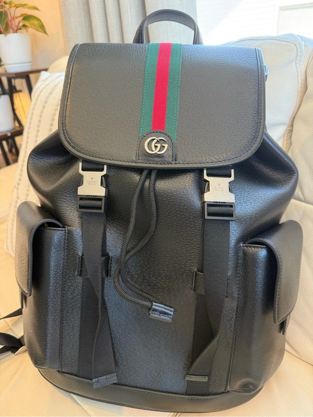 Used Black Leather Backpack with Signature Green-Red Stripe